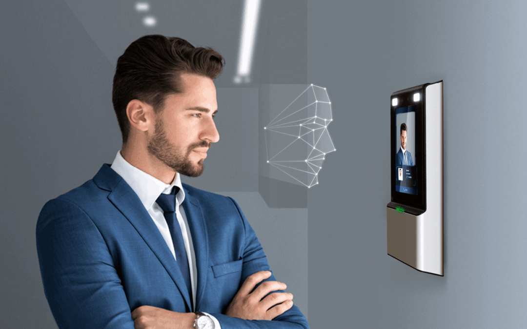 Man in suit looking at screen on wall